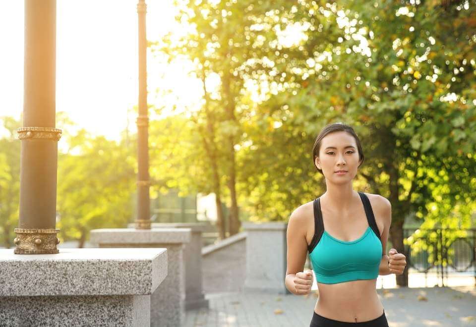 Woman running in park