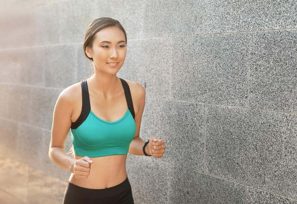 Woman running and happy