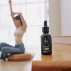 midnight CBD oil 600mg with a girl doing yoga